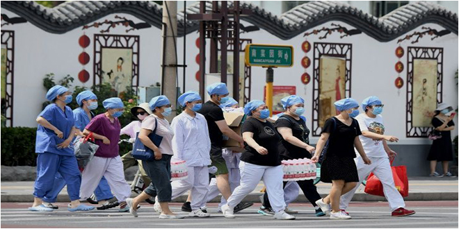 بكين تلغي رحلات وتغلق المدارس مجددا بعد رصد إصابات جديدة بكورونا